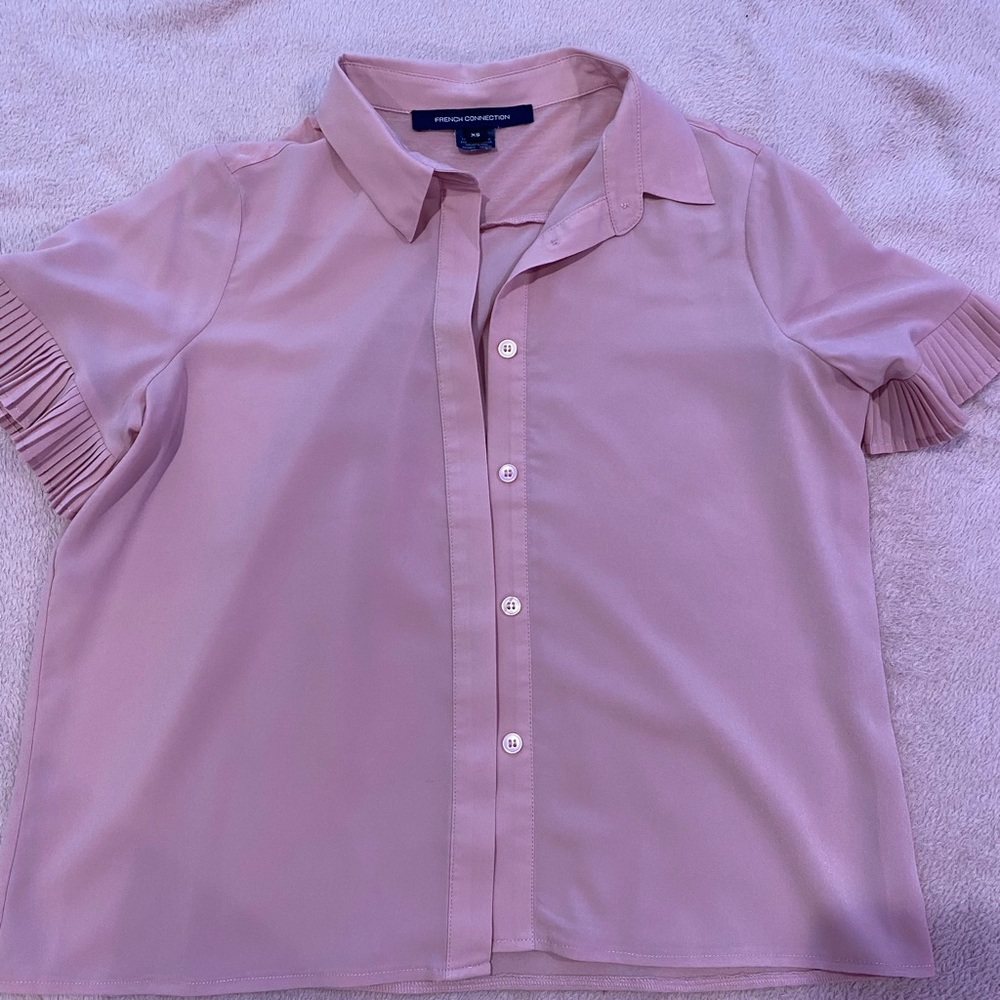 Size XS French connection button down top with frill/puff sleeve. Loose fit.